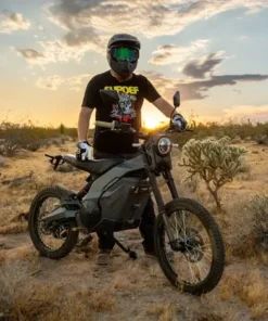 A person looking like a bike rider dress with helmets, holding a Caofen F80 DS-48 ready to go Trailing
