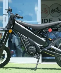 Talaria X3 Mini Lite electric dirt bike riding-ready on a rugged Australian off-road track
