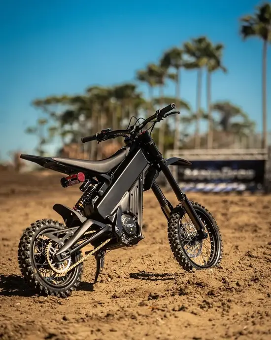 Talaria X3 Mini Lite electric dirt bike on an off-road dirt track in Australia