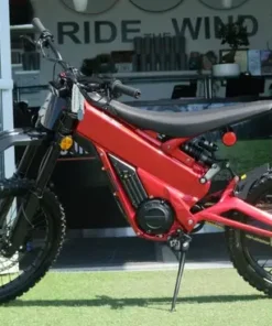 Red Talaria X3 Pro electric dirt bike for sale in Australia, side profile showing off-road knobby tyres, disc brakes, and lightweight frame — ideal electric trail bike for Aussie riders